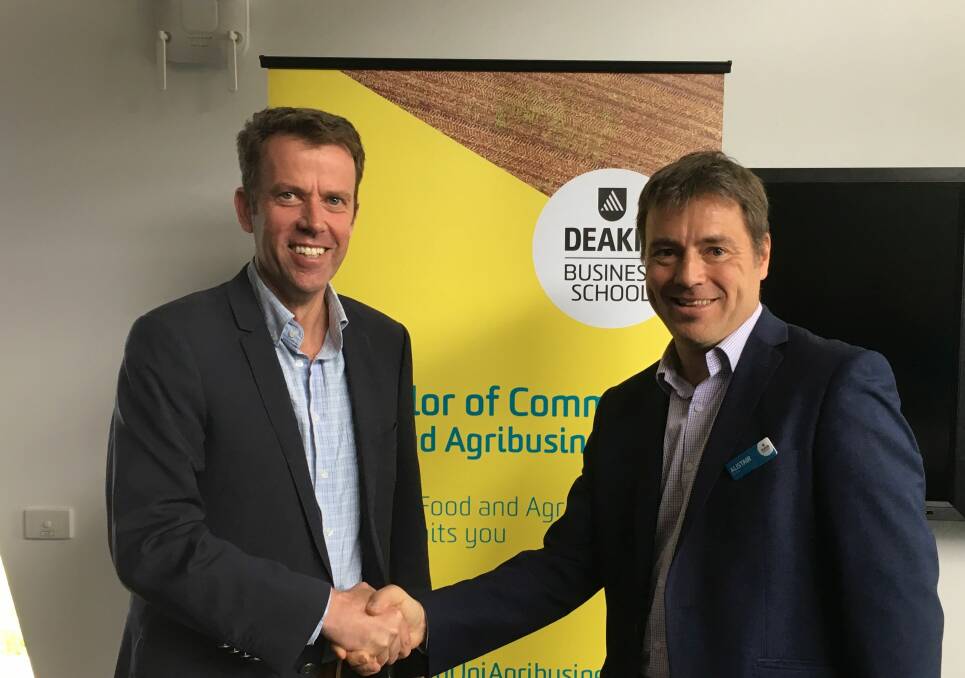 Food for thought: Wannon MP Dan Tehan and Warrnambool campus manager Alistair McCosh celebrate a new major in food and agribusiness was launched at Deakin University's Warrnambool campus on Thursday. The major will be part of the Bachelor of Commerce degree.