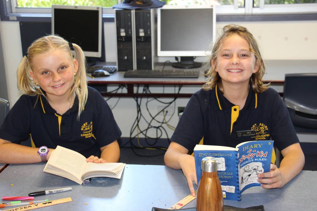 Port Fairy Consolidated School students Topsea Vanlaws and Charlie Bartlett work on their literacy. 
