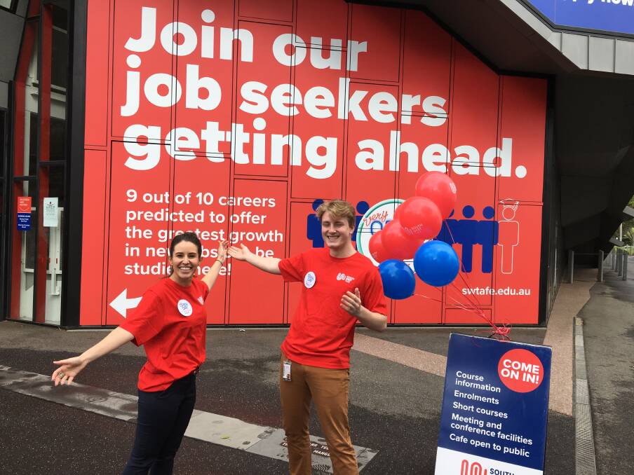Come on in: South West TAFE customer service officers Lisa Fraraccio and Angus MacDonald are excited about Sunday's open day. Picture: Madeleine McNeil