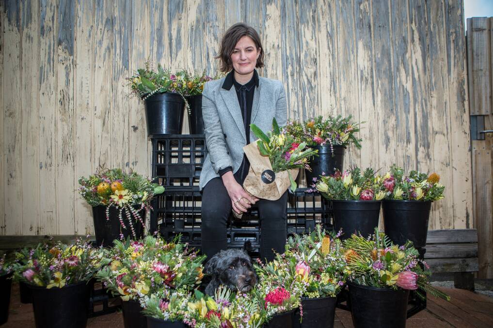 Free blooms: Sinéad Murphy will have a pop-up flower stall in Liebig Street on Friday to introduce shoppers to placemaking. Picture: Christine Ansorge