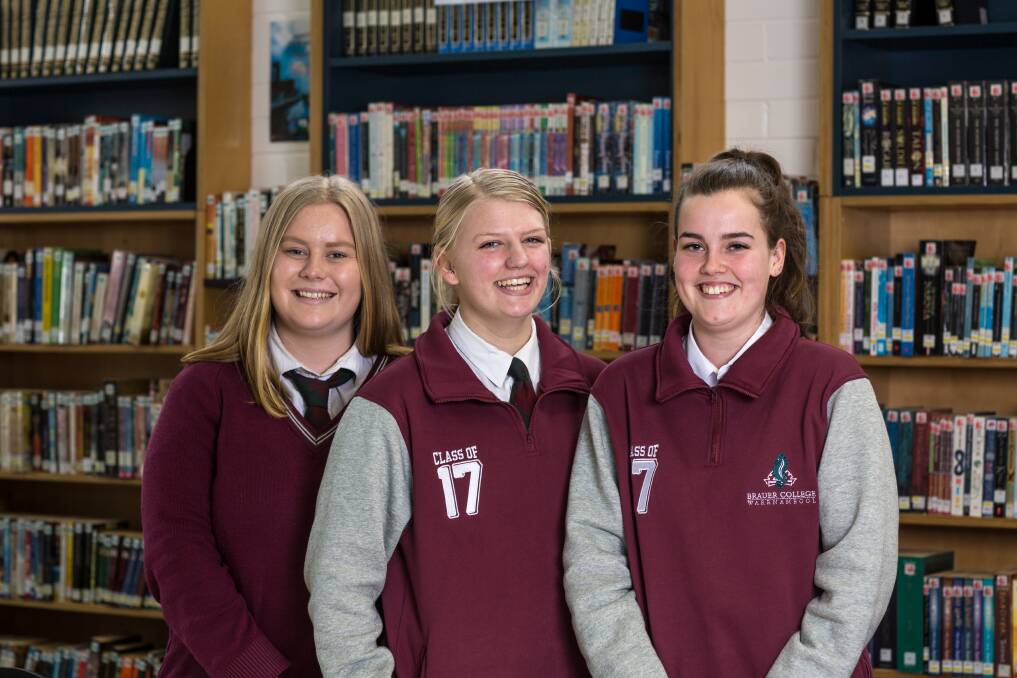 Trip of a lifetime: Brauer College students Lori Carlin, 18, Phoebe Cody, 18, and Shelby Jenkins, 17, are looking forward to heading to the Philippines later this month. Picture: Christine Ansorge