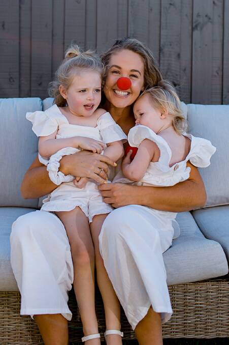 Serious role: Former resident Amie Rohan is a Red Nose Day ambassador and proud mum of Bella, Bella's twin Willow who died shortly after birth, and Sadie. Red Nose Day, on Friday, raises awareness of Sudden Unexpected Death in Infancy. Picture: Monika Berry