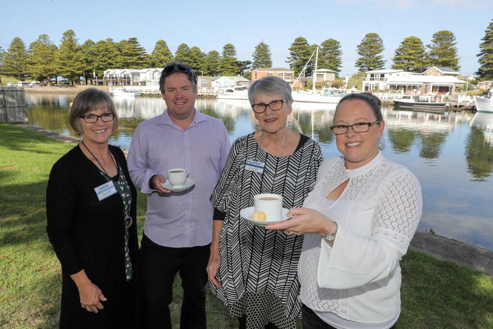 Time for a cuppa: Port Fairy's Biggest Morning Tea attendees Denise Leembruggen, Matt Dempsey, Heather Hampson and Kate Dempsey enjoy last year's event. Picture: Rob Gunstone
