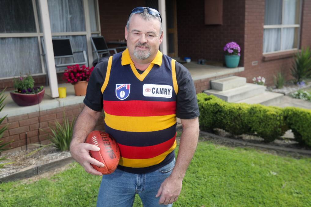 Carn the Crows: Adelaide fan Garry Vanstone has been a one-eyed Crows supporter since the team joined the league in 1991. He is predicting the Crows will win by six goals in Saturday's grand final. Picture: Morgan Hancock