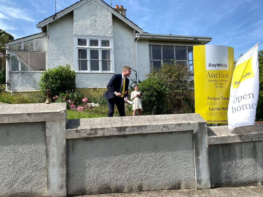 Ray White Warrnambool auctioneer Fergus Torpy auctions a four-bedroom home at 210 Liebig Street which sold to a local buyer who intends to renovate the historic home. Picture by Madeleine McNeil