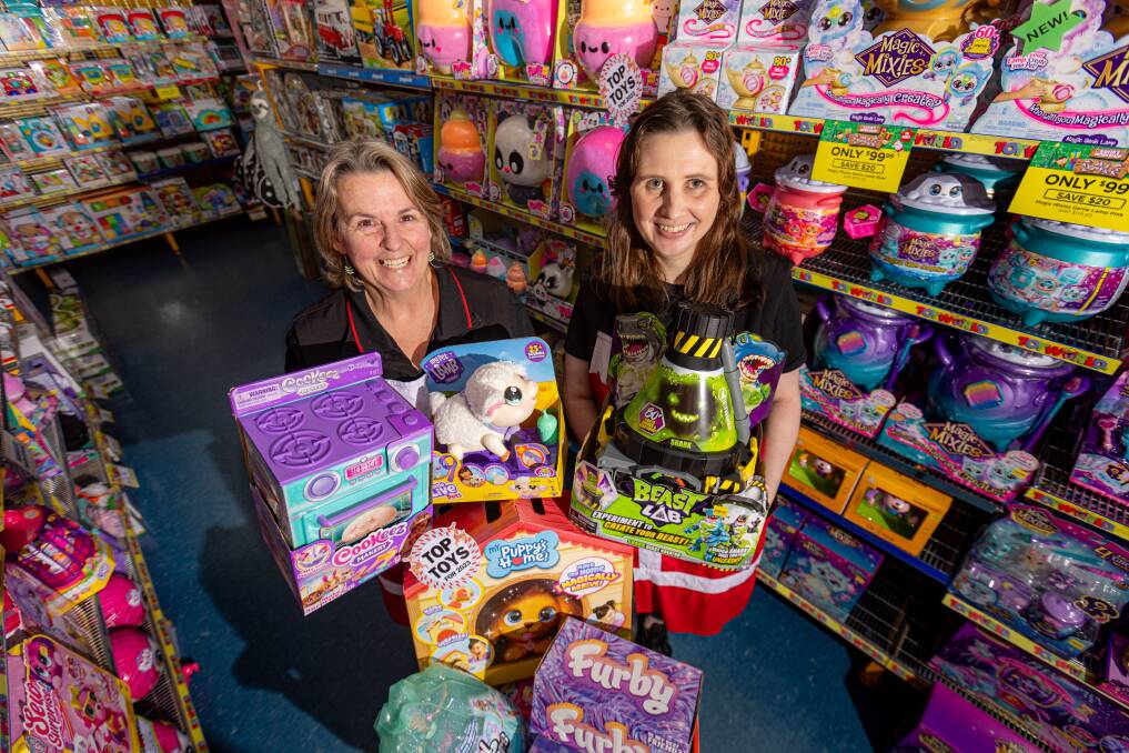 Warrnambool Toyworld owner Karina Valente and team member Erika Hyland with some of its top toys for Christmas 2023. Picture by Eddie Guerrero