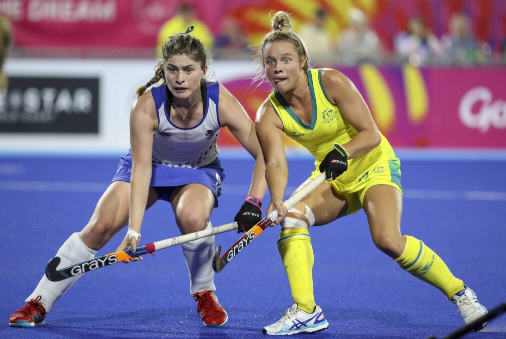 EYES ON THE PRIZE: Warrnambool export Madi Ratcliffe (right) in action for the Hockeyroos at the 2018 Commonwealth Games on the Gold Coast. Picture: Grant Treeby/Hockey Australia