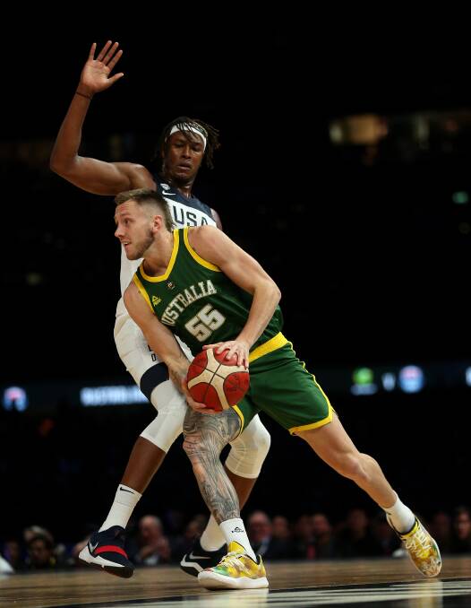 OUTTA MY WAY: Australia's Mitch Creek tries to get past Team USA's Myles Turner at Marvel Stadium on Thursday night. Creek finished with three points from 10 minutes on court. Picture: AAP 