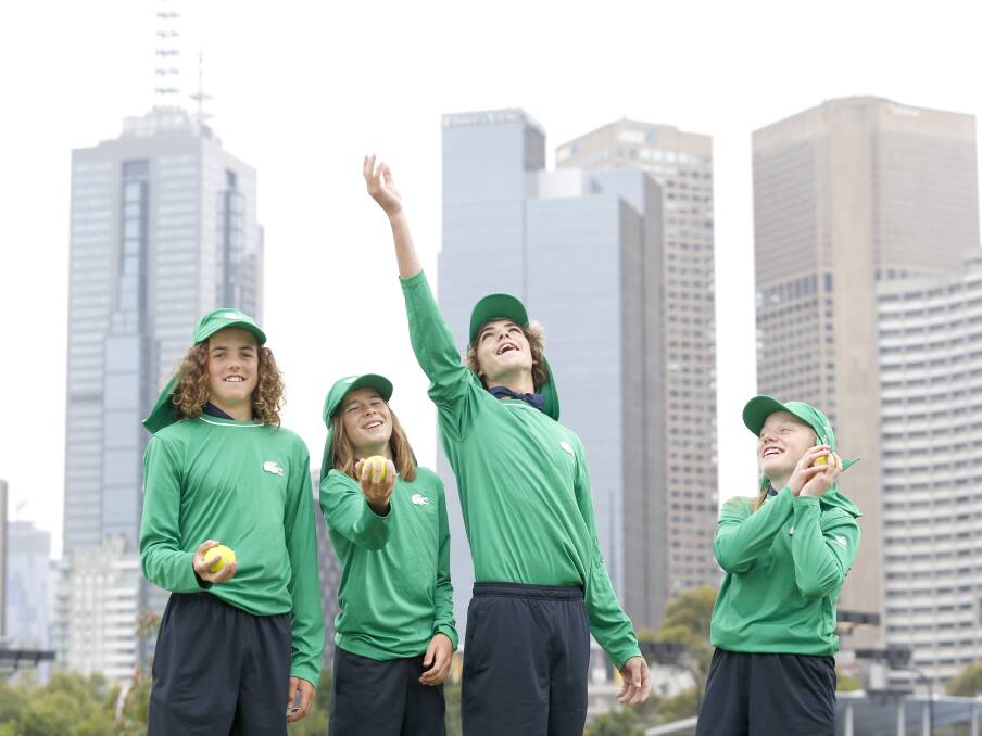 TOP VIEW: Ned Timms, Jackson Timms, Joseph Mahony and Danielle Warren are ready for ball kid duties. Picture: Luke Hemer/Tennis Australia
