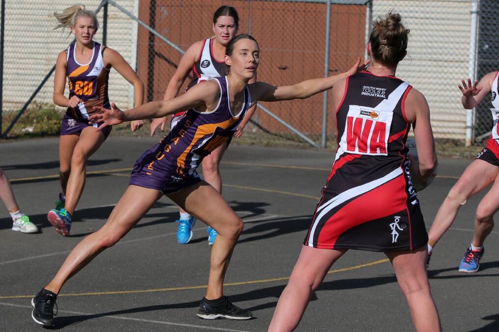 STRETCH: Port Fairy's Laura Lafferty plays defence against Koroit on Saturday. Picture: Rob Gunstone