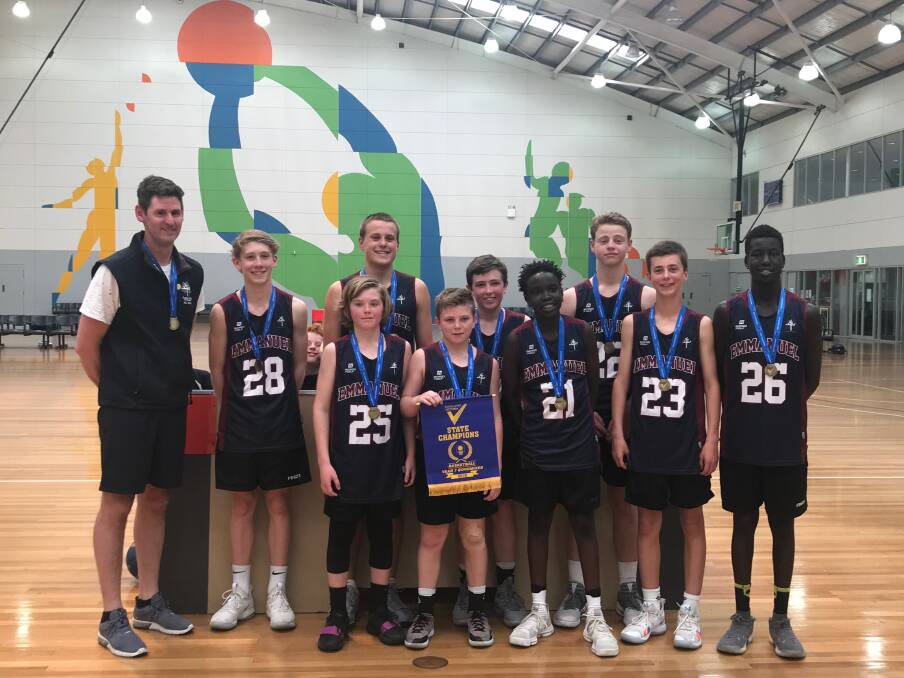 STATE'S BEST: Emmanuel College's year 7 boys won the School Sport Victoria basketball title in Melbourne on Monday. Proud coach Shane Smith (pictured left) was thrilled with its performances.