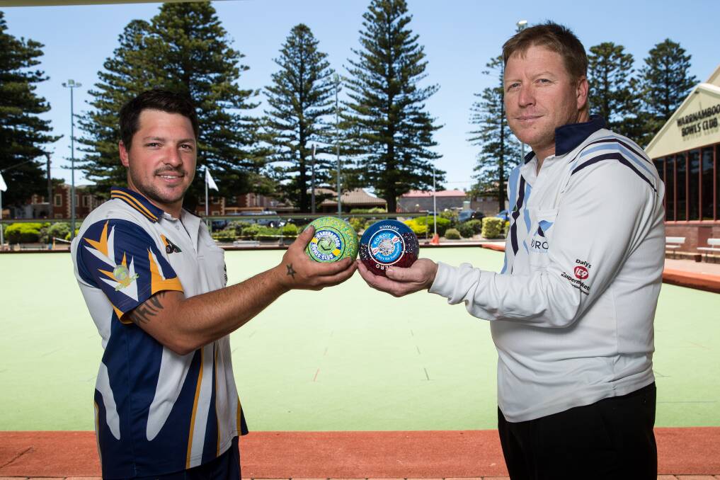 THE TEST: Warrnambool Gold's Tristan McArthur and Koroit's Blue's Les Johnson ahead of the first-versus-second match. Picture: Christine Ansorge