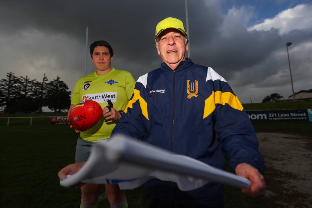 NUMBERS UP: Warrnambool and District umpires Damon Harrison and Daryl Pedler will celebrate milestones on Saturday. Picture: Morgan Hancock 