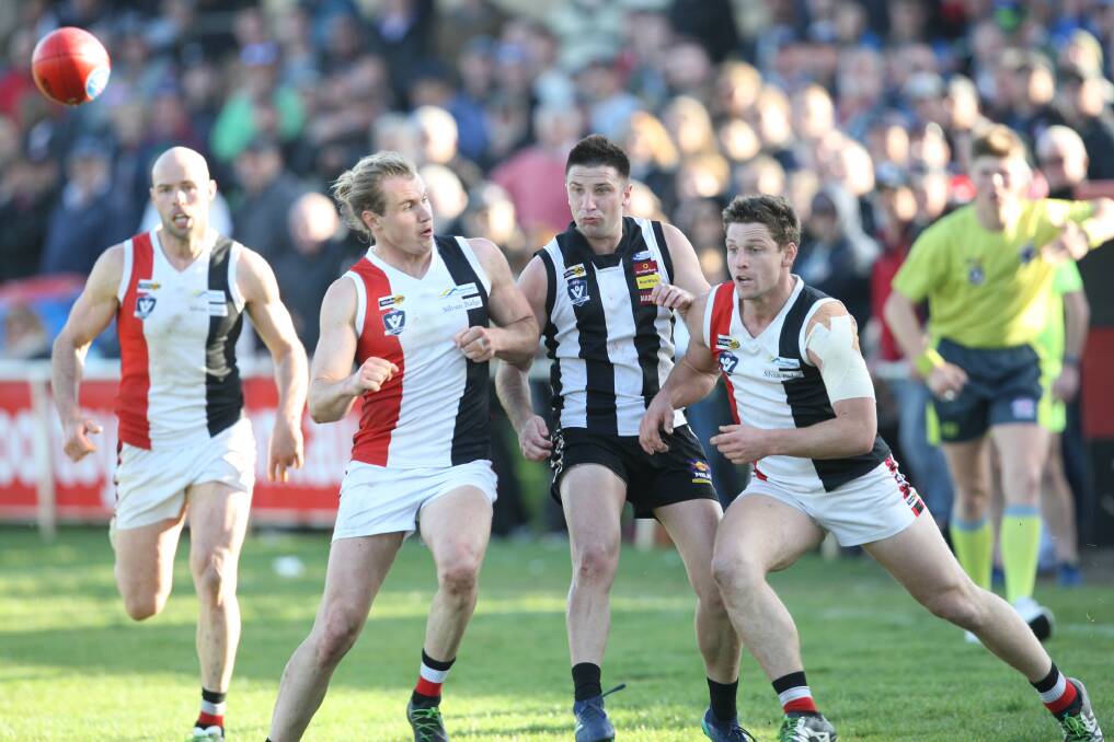 NO LOST LOVE: Koroit's Will Couch, pictured opposed to Camperdown's Fraser Lucas in the grand final, will miss the rematch in round two next season due to a suspension stemming from the game. Picture: Michael Chambers 