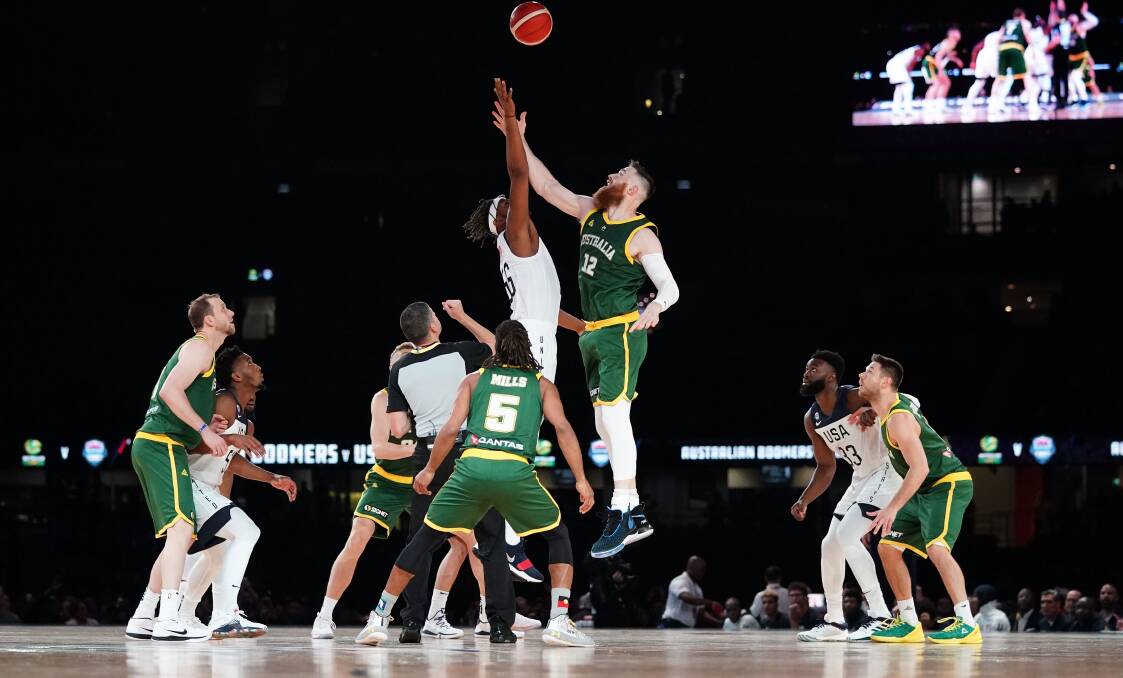 TIP OFF: Australia and Team USA played a basketball game at Marvel Stadium, which was purpose-built for Australian Rules football, on Thursday night. Picture: AAP 
