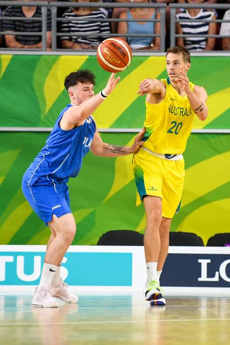EFFECTIVE: The athletic Nathan Sobey in action for Australia against Scotland on Saturday. The Boomers were convincing Commonwealth Games semi-final winners.