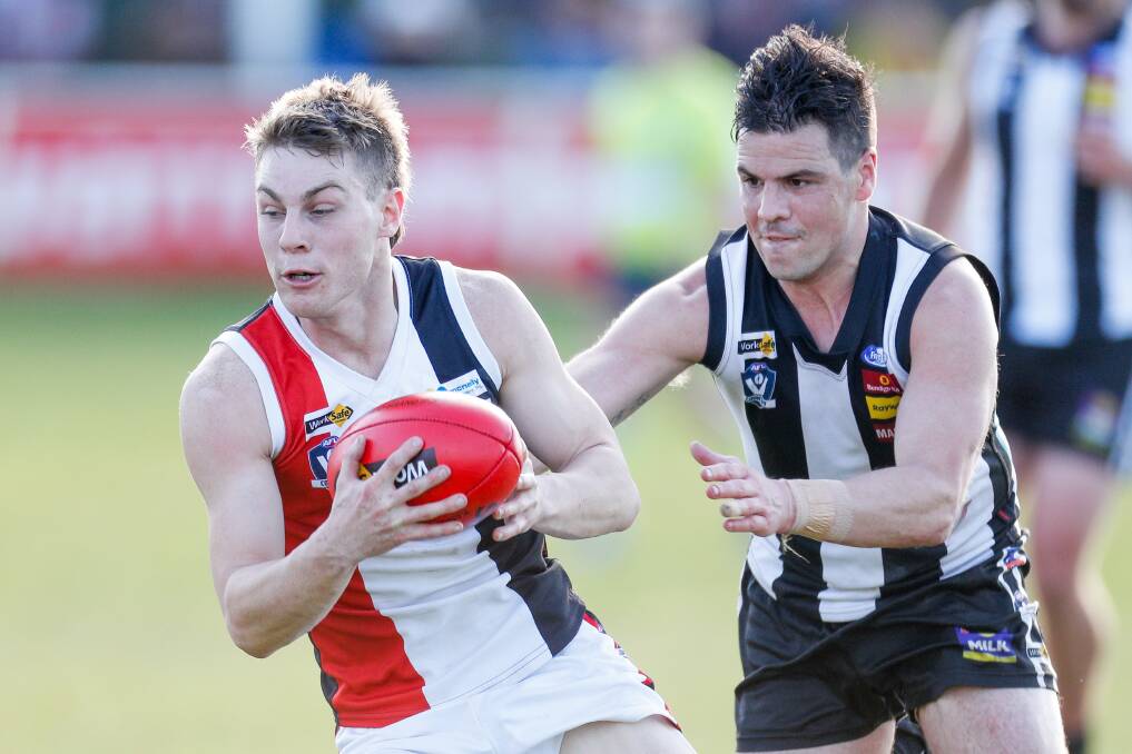 FUTURE TEAMMATES: Koroit's Blair McCutcheon is considering relocating to Queensland to play for former Camperdown coach Phil Carse at NEAFL club Redland. The pair were Hampden league grand final opponents in 2018. Picture: Morgan Hancock