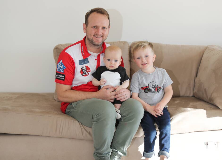 DADDY DAY CARE: South Warrnambool coach Mat Buck loves spending his days with sons Hugo, six months, and Oscar, 3. Picture: Morgan Hancock