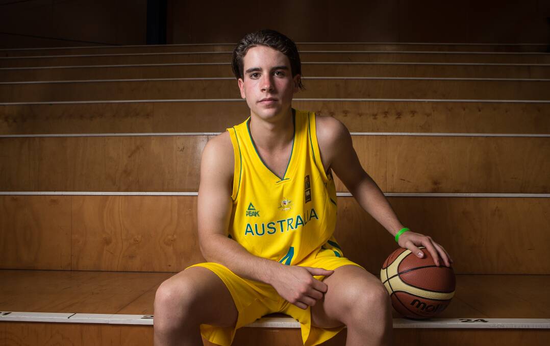 MULTI-TALENTED: Warrnambool-based teenager Liam Herbert will swap his Australian basketball jersey for a Greater Western Victoria Rebels' football uniform on Saturday. Picture: Christine Ansorge
