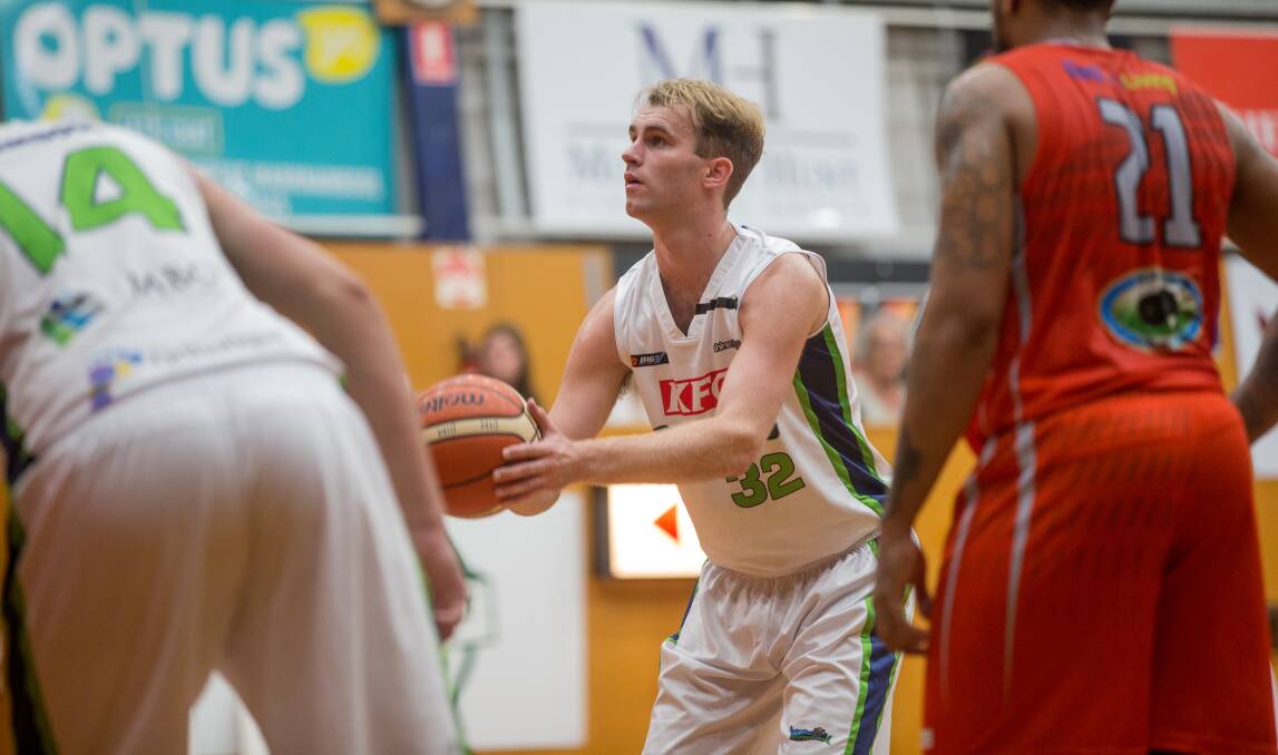 SINKING BUCKETS: Ollie Bidmade was influential for Warrnambool Seahawks in their Big V road win against Geelong Supercats on Sunday. He scored 21 points. Picture: Christine Ansorge
