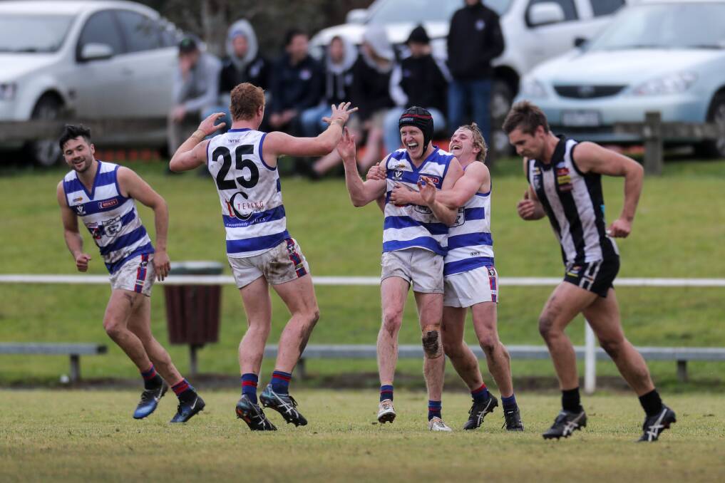 PUMPED: Terang Mortlake teammates celebrate one of Jordie McKenzie's three goals for the Bloods on Saturday at DC Farran Oval. Picture: Rob Gunstone
