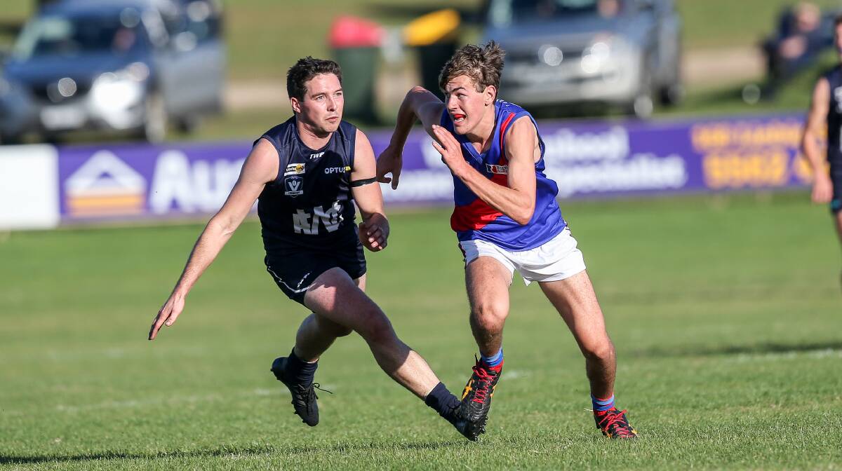 CALL UP: Terang Mortlake's Isaac Wareham, pictured opposed to Warrnambool's Jackson Bell, will make his TAC Cup debut. Picture: Christine Ansorge