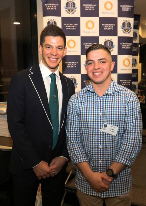 HERO: Aspiring wicket-keeper Tommy Jackson (right) was humbled to meet Australian captain Tim Paine at the Australian Cricket Society awards. 