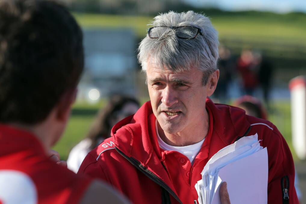ADVICE: Former South Warrnambool coach Nigel Kol is there to give son Noah advice on his football. Picture: Rob Gunstone