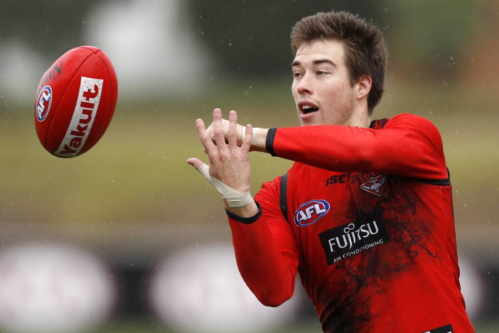 BREAKING FREE: Cobden export Zach Merrett is learning to shake a tag as AFL opponents put time into negating the Essendon ball winner. Picture: AAP