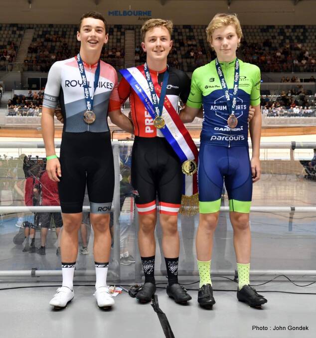 PODIUM FINISH: Warrnambool's Eddie Worrall (left) finished second in the Austral Wheel Race under 17 male section at Melbourne Arena on Saturday. Picture: John Gondek/Cycling Victoria