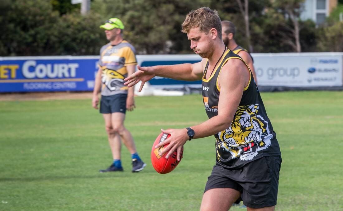 YELLOW AND BACK: Tom Sharp is back in Portland colours and excited to help the Tigers claw up the ladder. Picture: Christine Ansorge