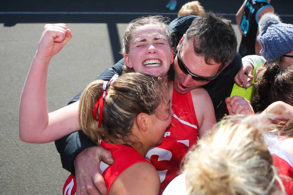 ELATED: Dennington's Kelsey Perry celebrates the Dogs' A reserve netball flag. Picture: Morgan Hancock 