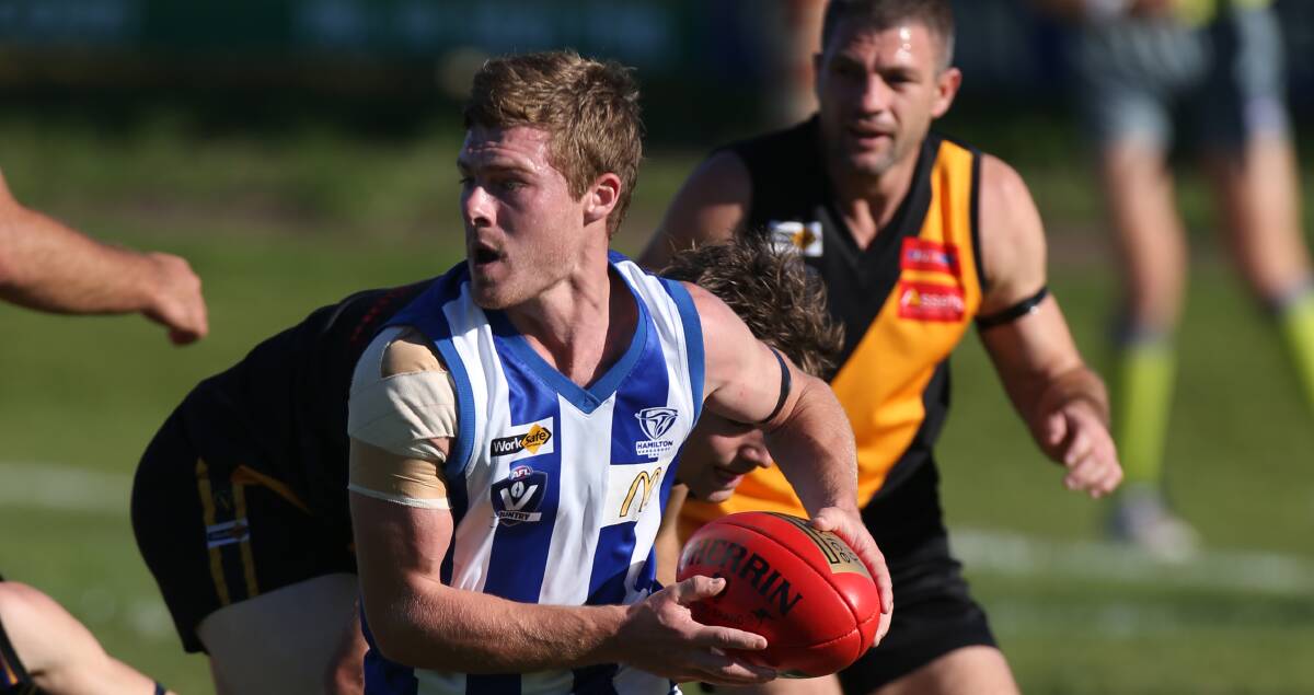 ON THE HOP: Hamilton Kangaroos midfielder Nathan Curtis against Portland on Anzac Day. Picture: Vicky Hughson