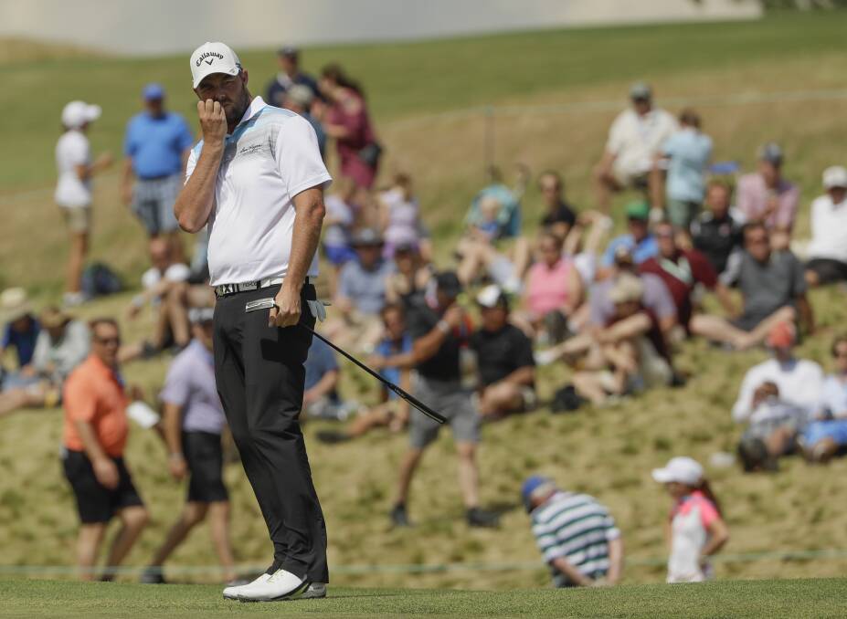 TENSE: Marc Leishman deep in thought on the final day's play. Picture: Getty