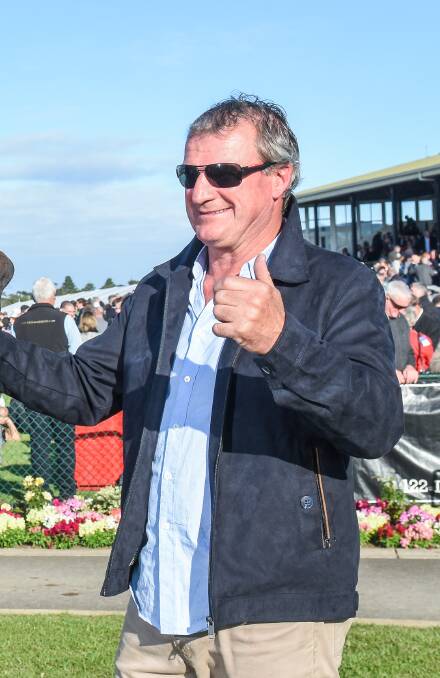 THUMBS UP: Darren Weir made it four Warrnambool Cup victories in a row when High Church saluted on Thursday. Picture: Todd Nicholson/Getty Images