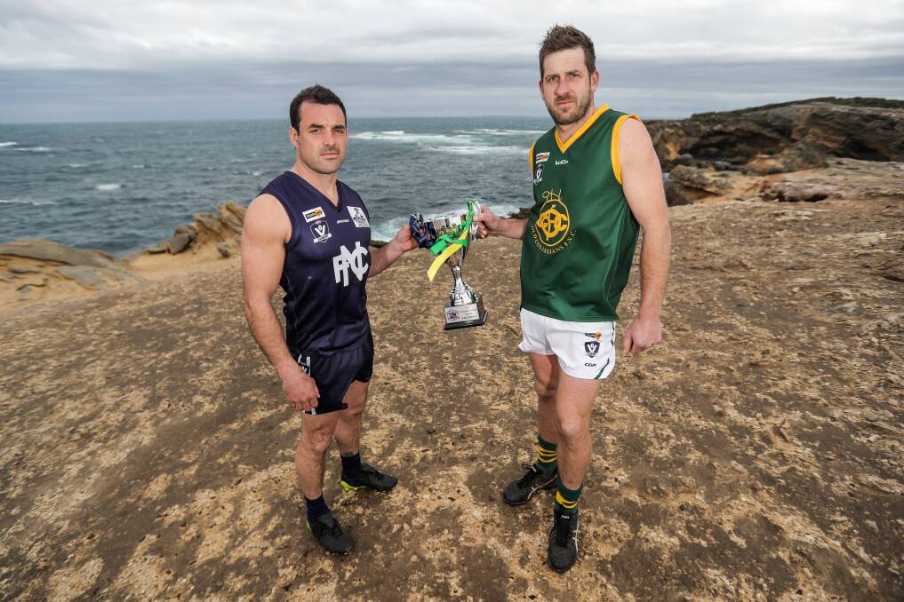 CAPTAIN CALL: Nirranda's Peter McDowall and Old Collegians' Daryl Beechey at Thunder Point with the premiership cup. Picture: Morgan Hancock