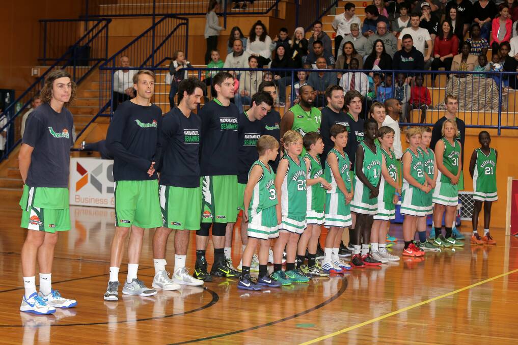 IDOLS: Warrnambool Seahawks' under 12 squad sang the national anthem with the Big V team before round one. Picture: Rob Gunstone