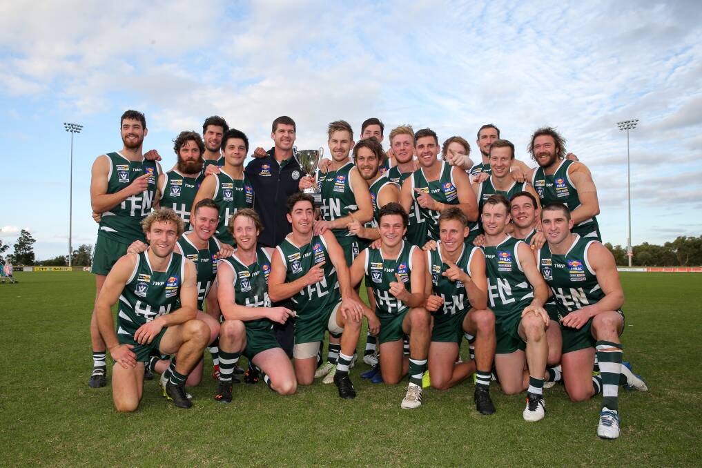GREEN MACHINE: Hampden celebrates its interleague win over South East at Casey Fields. Picture: Rob Gunstone