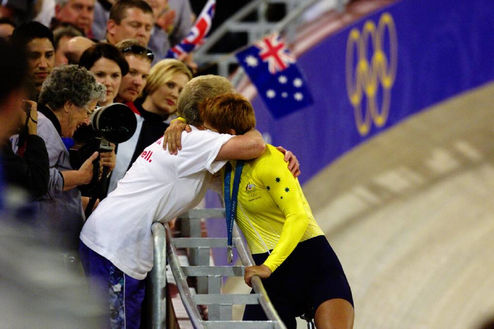 Proud moment: Australia's Michelle Ferris celebrates with a member of the crowd after winning silver at the Sydney Olympic Games in 2000.