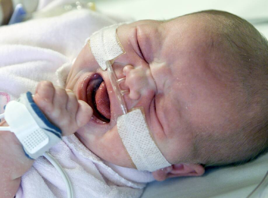 AT RISK: Doctors warn people around newborns to get a whooping cough booster immunisation.