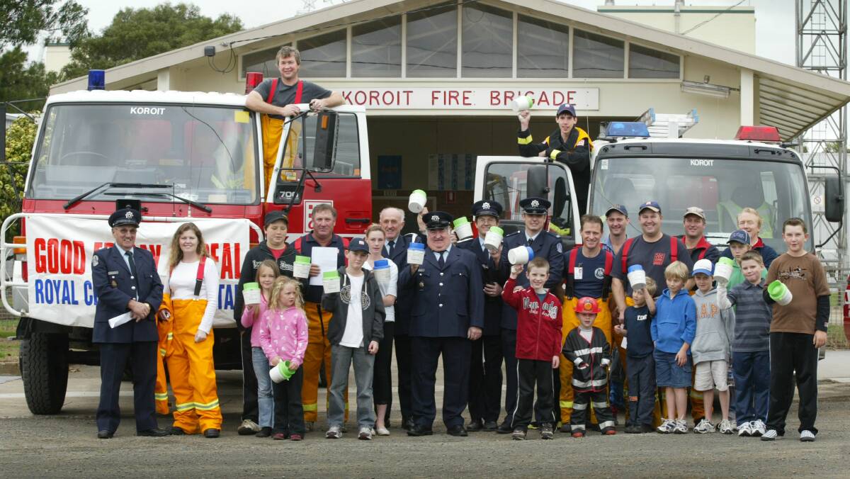 TEAM: Members of the Koroit CFA and the general community out the front of the then fire station in High Street, getting ready to collect for the 2007 Good Friday Appeal. 