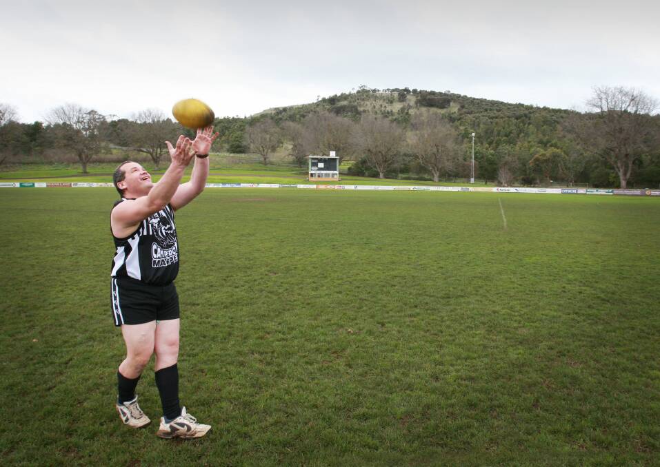 Helping out: Peter Conheady, during his days as Camperdown president, getting in some practice for his first reserves footy game (2007). He played because the reserves were struggling for numbers.