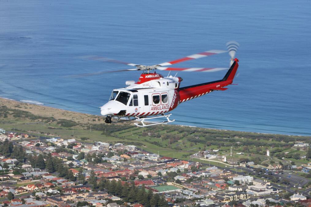 Birthday celebration: The original south-west based HEMS 4 Air Ambulance helicopter flies over Warrnambool after arriving at its new base in 2009. The service is having a 10th birthday party this weekend.