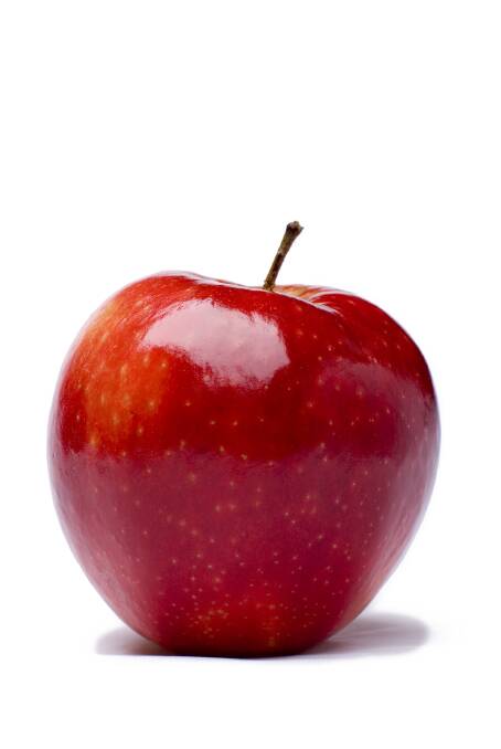 People are investigating a report of a needle in an apple.