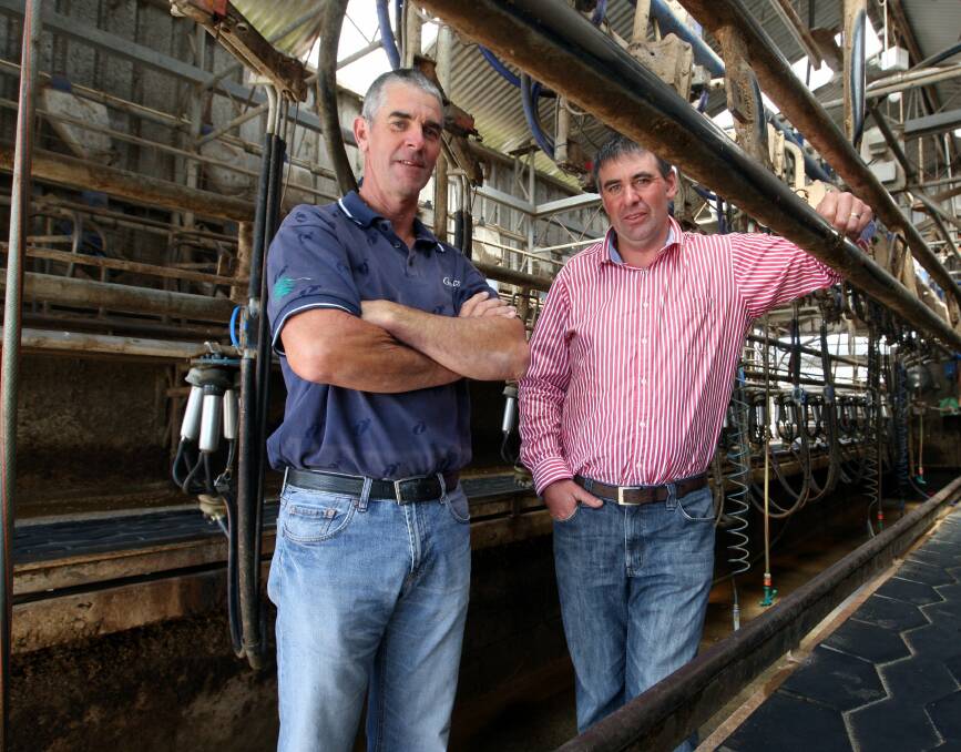 DOWNSIZING: Farmer Power member Jock O'Keefe, pictured with Crossley dairy farmer Chris Gleeson, is not surprised a number of dairy farmers are struggling to pay their bills.Picture: Leanne Pickett
