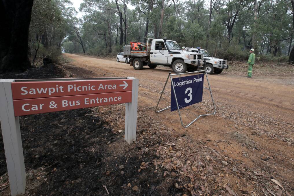 Recovered: DEPI staff organise a Logistics Point near the closed Sawpit Picnic Area, after the Mt Clay State Forest fire. Picture: ROB GUNSTONE
