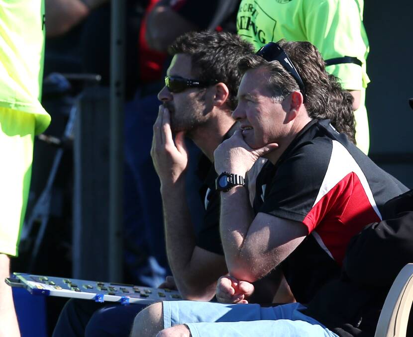 FLASHBACK: (l-r) Chris McLaren and Adam Dowie watch on as Koroit battles for supremecy against Warrnambool in the 2014 Hampden league's senior football second semi-final.