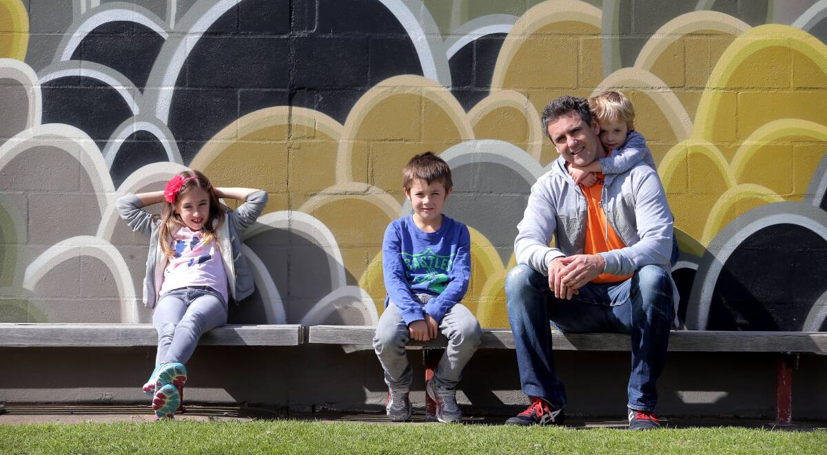 FLASHBACK: Leon Cameron with children Amelia, then nine, Harry, then eight, and Jack, then three, in Warrnambool in 2014.