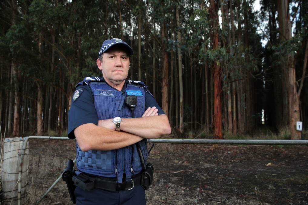 Stay out: Macarthur police Senior Constable David Rook is warning people that anyone entering a blue gum plantations faces prosecution. Picture: ROB GUNSTONE