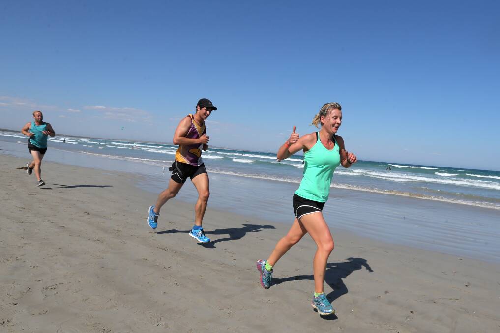 SAND? NO WORRIES: Competitiors make easy work of Port Fairy's East Beach during the 2017 fun run. Pictures: Rob Gunstone, Morgan Hancock